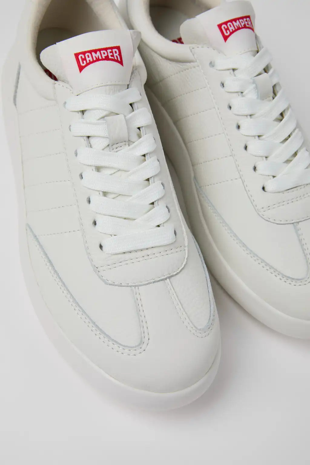 Pelotas Xlite Black Leather Sneakers for Women.