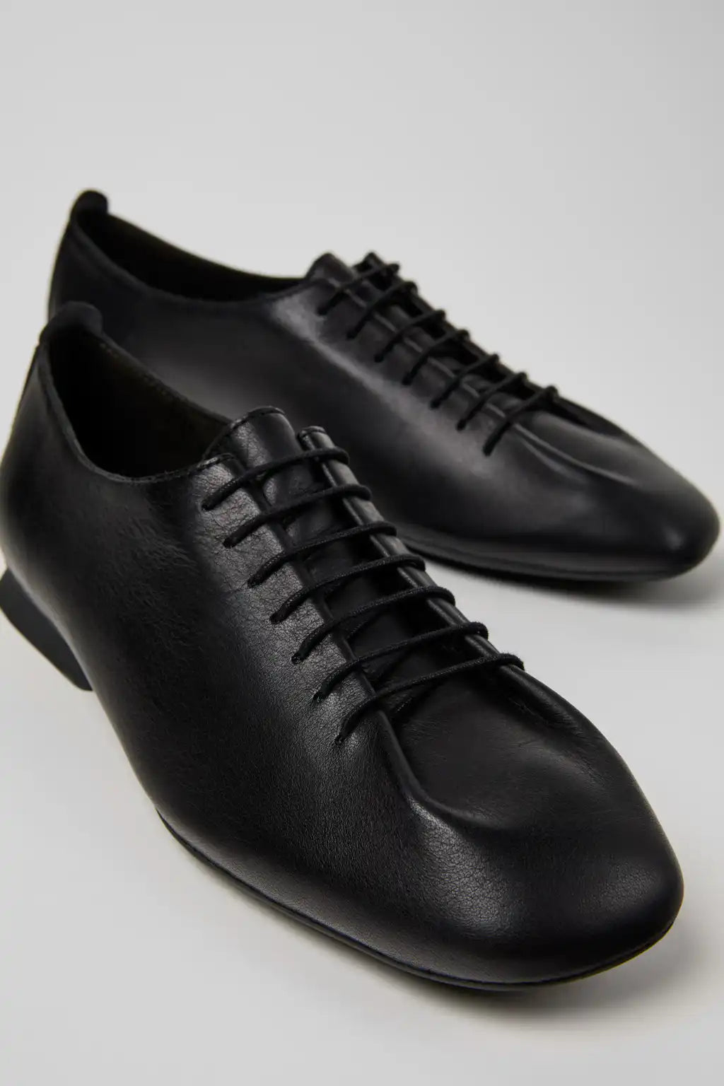 Casi Myra Black Leather Shoes for Women.