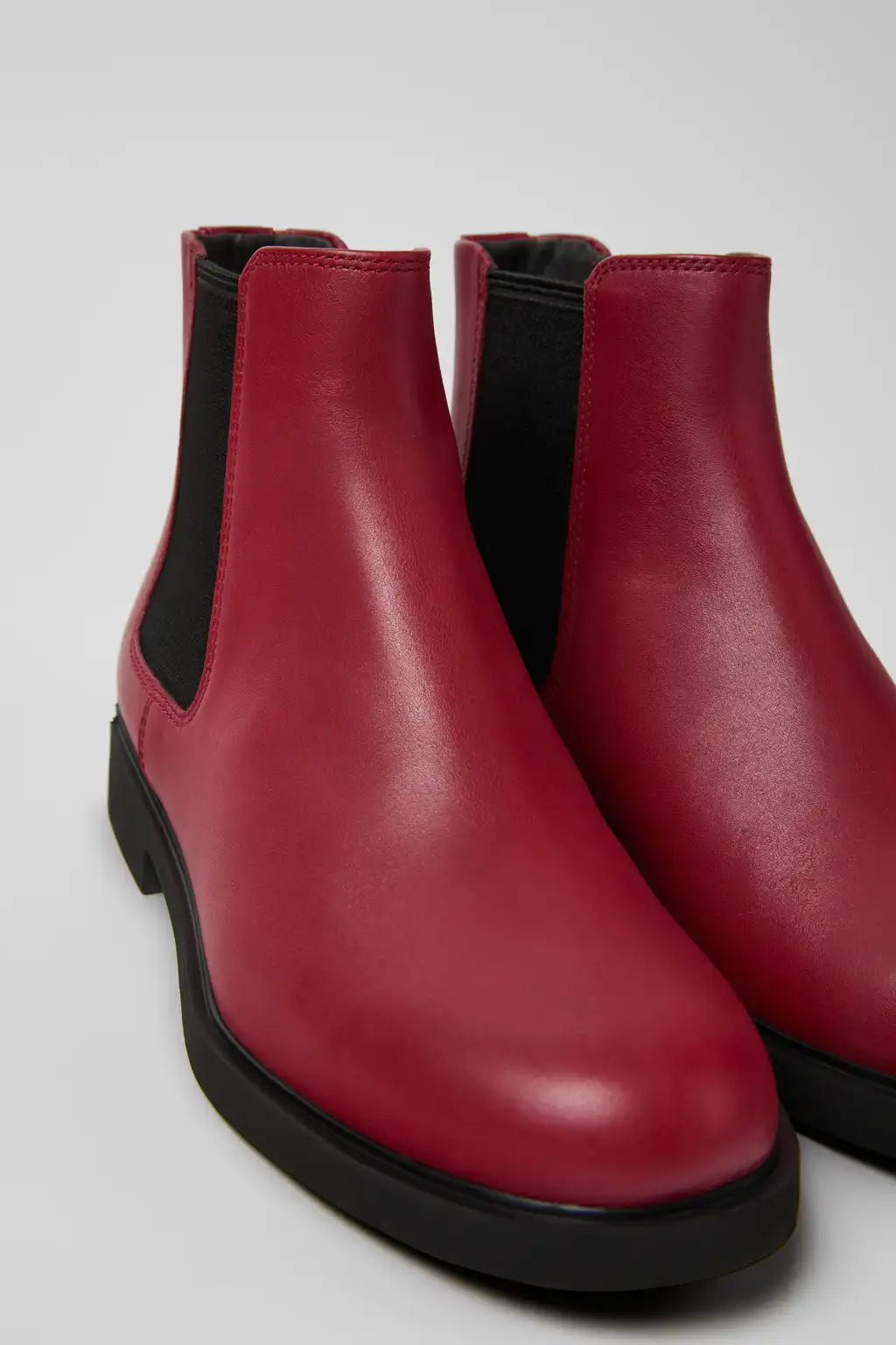 Iman Black Leather Ankle Boots for Women.