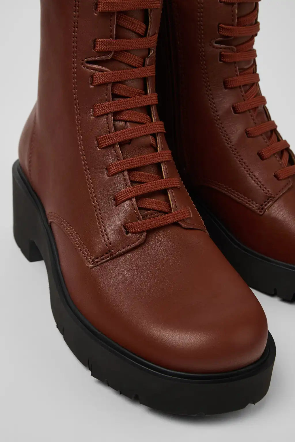 Milah Black Leather Ankle Boots for Women.