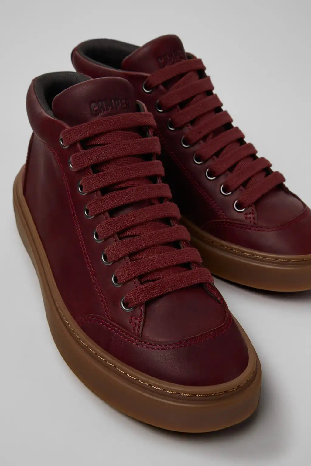Runner Twentyfive Burgundy Leather Sneakers for Women.