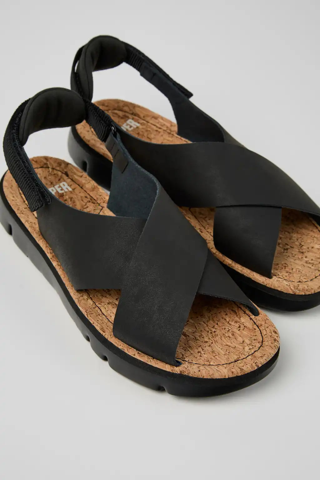 Oruga Black Leather and Textile Sandals for Women.