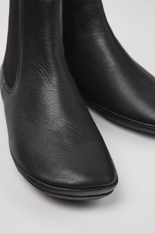 Right Black leather ankle boots