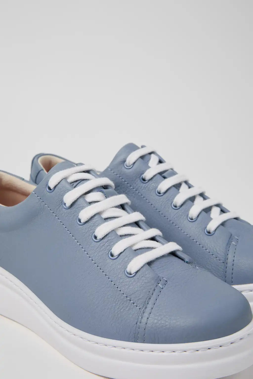 Runner Up White Leather Sneakers for Women.