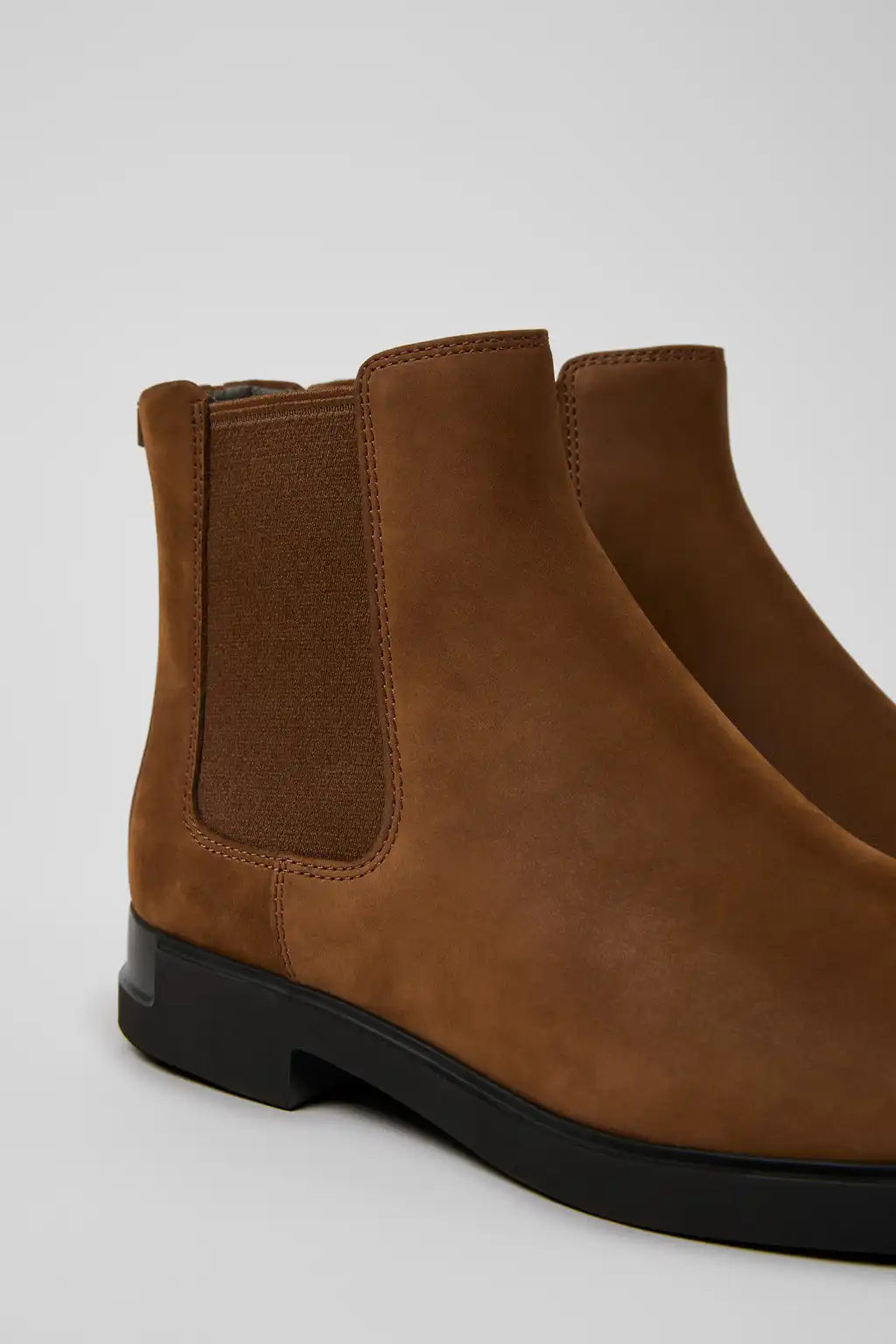 Iman Black Leather Ankle Boots for Women.