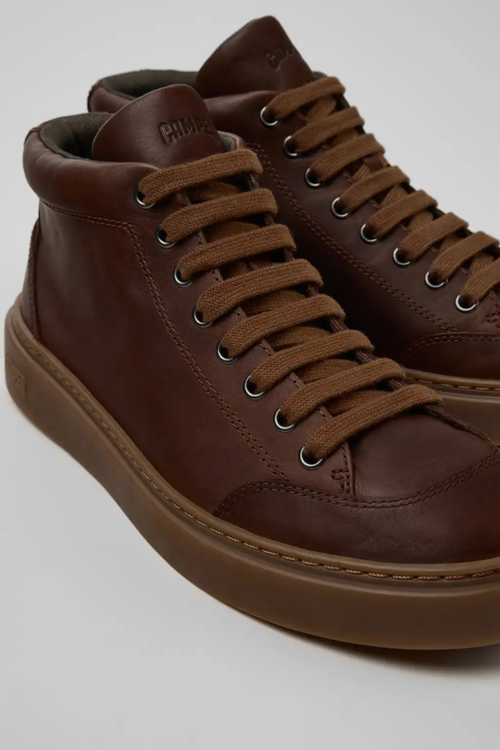 Runner Twentyfive Black Leather Sneakers for Men.
