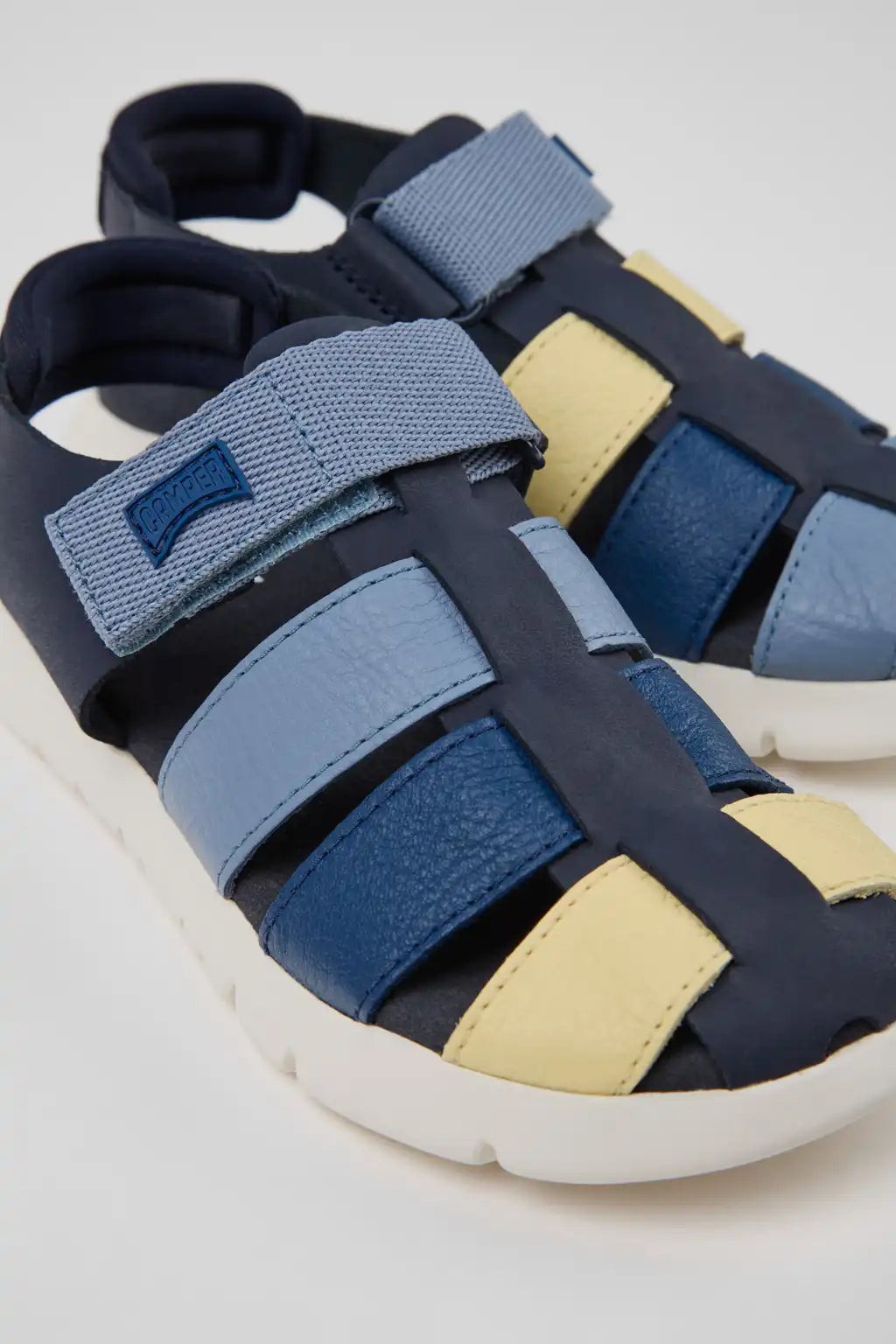 Oruga Blue Leather and Textile Closed Sandals for kids.