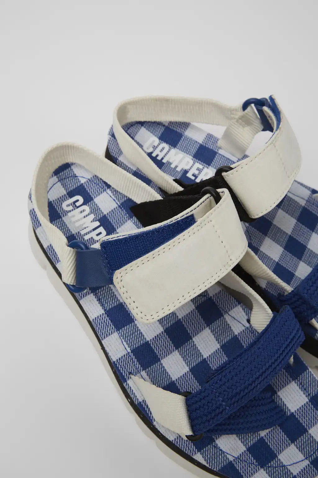 Oruga Up White, blue, and black sandals for women