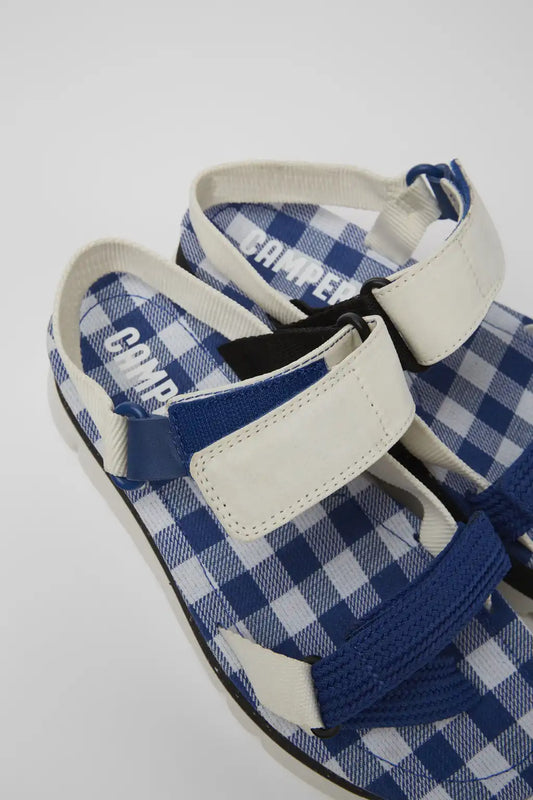 Oruga Up White, blue, and black sandals for women