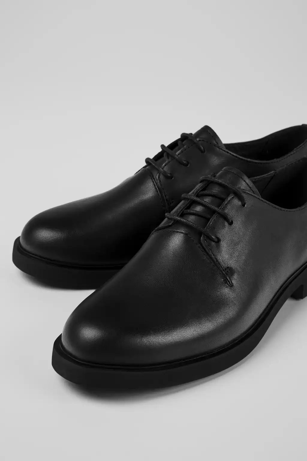 Iman Black Leather Shoes for Women.
