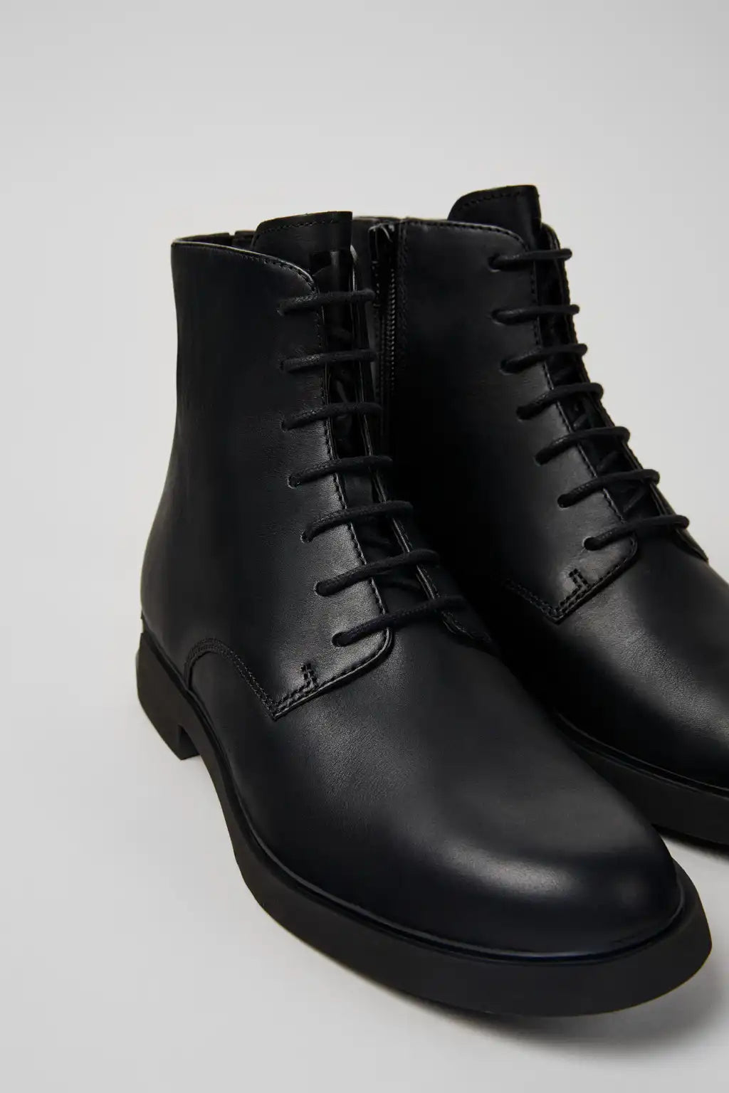 Iman Brown Leather Ankle Boots for Women.