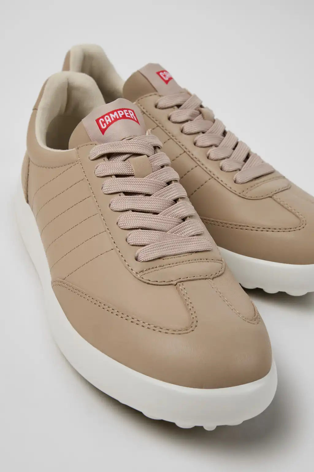 Pelotas Xlite Black Leather Sneakers for Women.