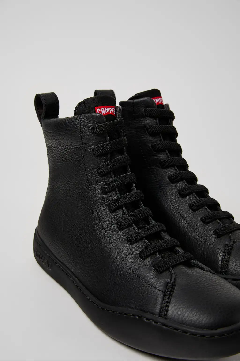 Peu Touring Black Leather Ankle Boots for Women.